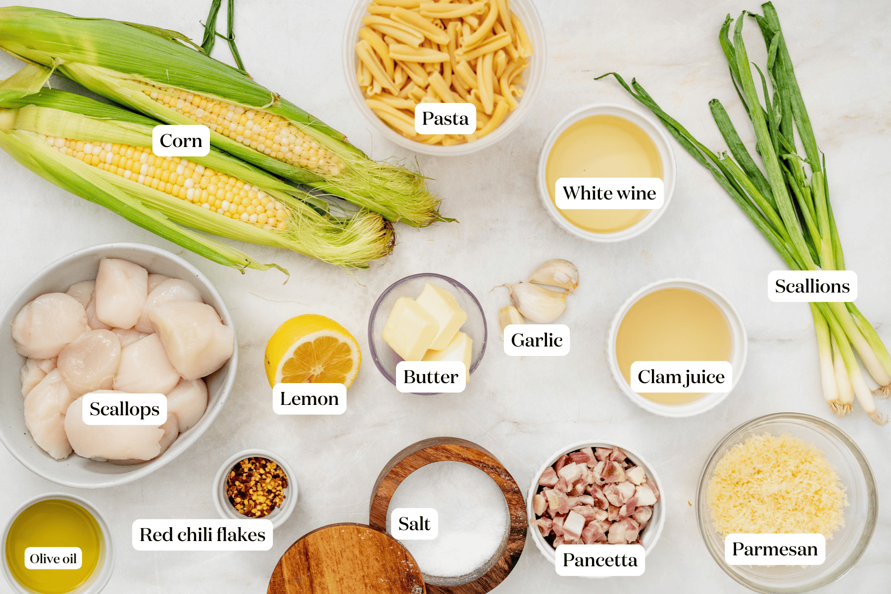 labeled ingredients for scallop corn pasta with white wine.