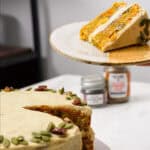 pumpkin carrot cake, slice on the upper right hand corner on a plate.