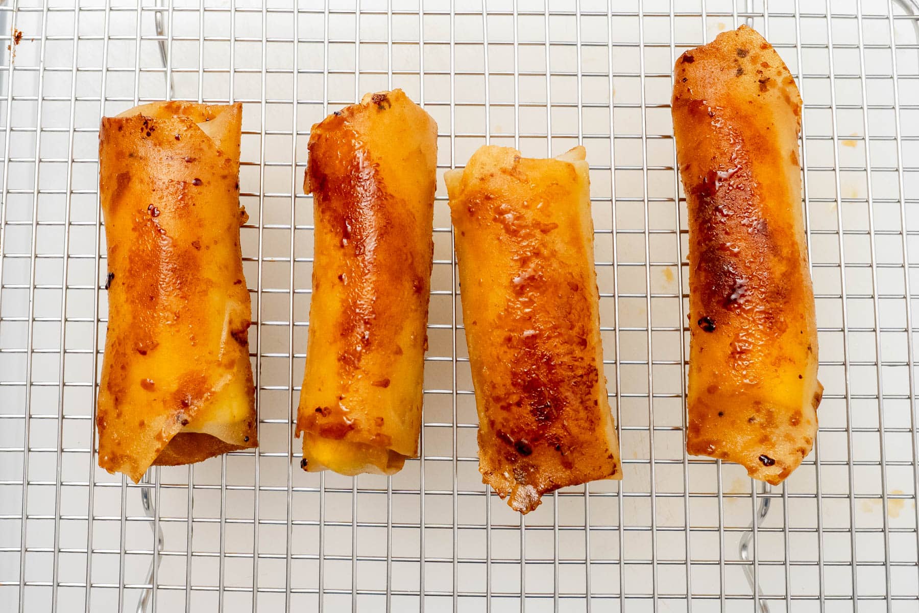 4 miso turons on a wire rack.