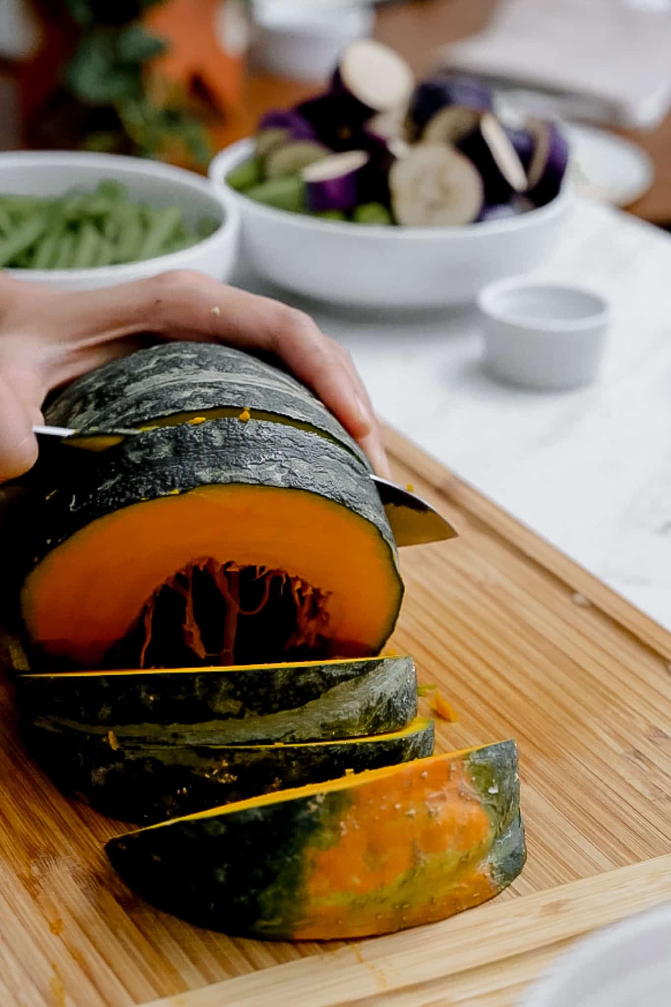 slicing kabocha squash.