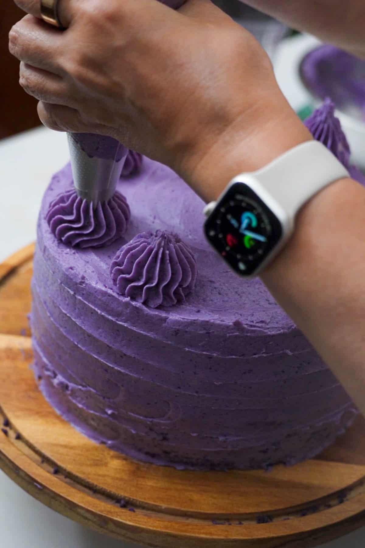 decorating ube cake.