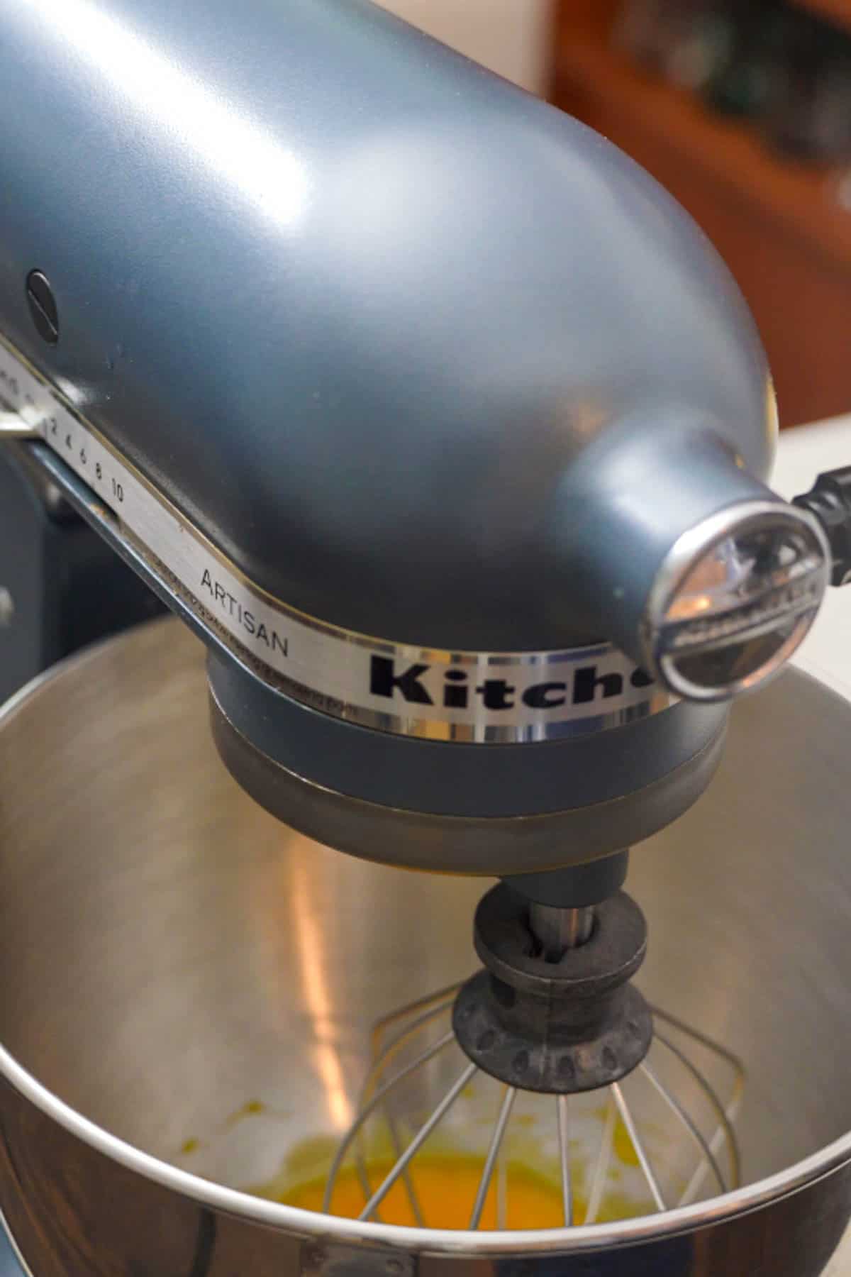 whisking egg yolks in stand mixer.