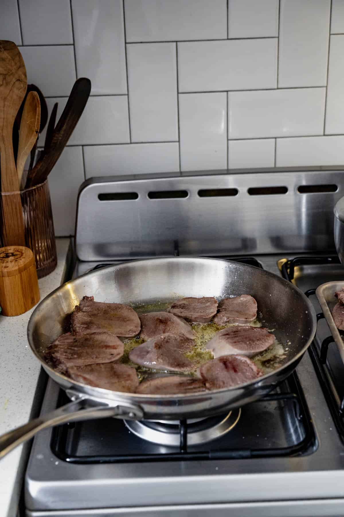 frying lengua in butter.